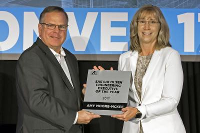 CS Alumnae Amy Moore-McKee accepts the Society of Automotive Engineers' Sid Olsen Engineering Executive of the Year Award.