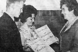 Robert Carr, then a senior at Lockport (Illinois) Township High School, receives a $250 scholarship from the Lockport Womanâ€™s Club. The award eventually inspired Carr to help young people of modest means reach college. (Image courtesy of Give Something Back Foundation.)