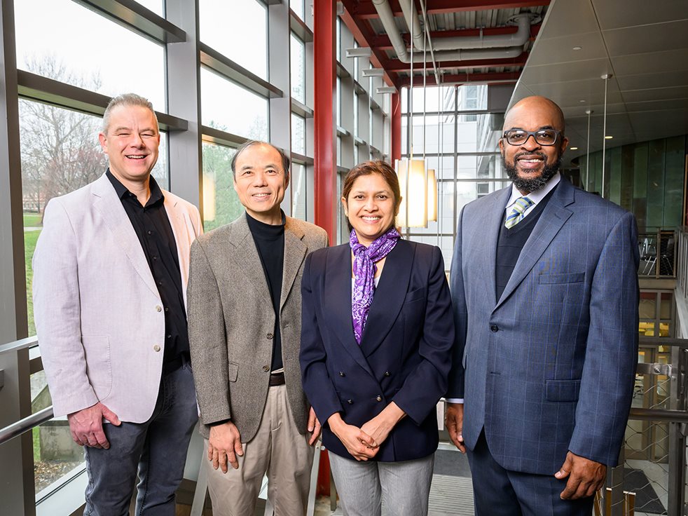 The leadership team includes, from left: INVITE director Chad Lane, a professor of educational psychology and of computer science; research co-director ChengXiang Zhai, the Donald Biggar Willett Professor of Engineering in computer science; electrical and computer engineering professor Suma Bhat; and evaluation director Rodney Hopson, a professor of evaluation in educational psychology.