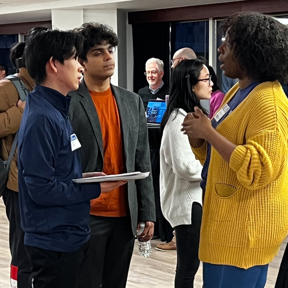 Photo from the After Hours event in Chicago featuring a number of students speaking with company recruiters in an informal setting.