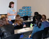 CS junior Briana Chapman teaches high school participants about text encoding techniques and cryptography at the Splash event April 11 in Siebel Center.