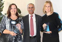 Rhonda McElroy (right) of CS @ ILLINOIS and Jeri Cochran (left) of Astronomy are joined by Graduate College Dean Deba Dutta, who recognized their achievement of being named the first recipients of the Graduate College Excellence Award for Graduate Contacts.