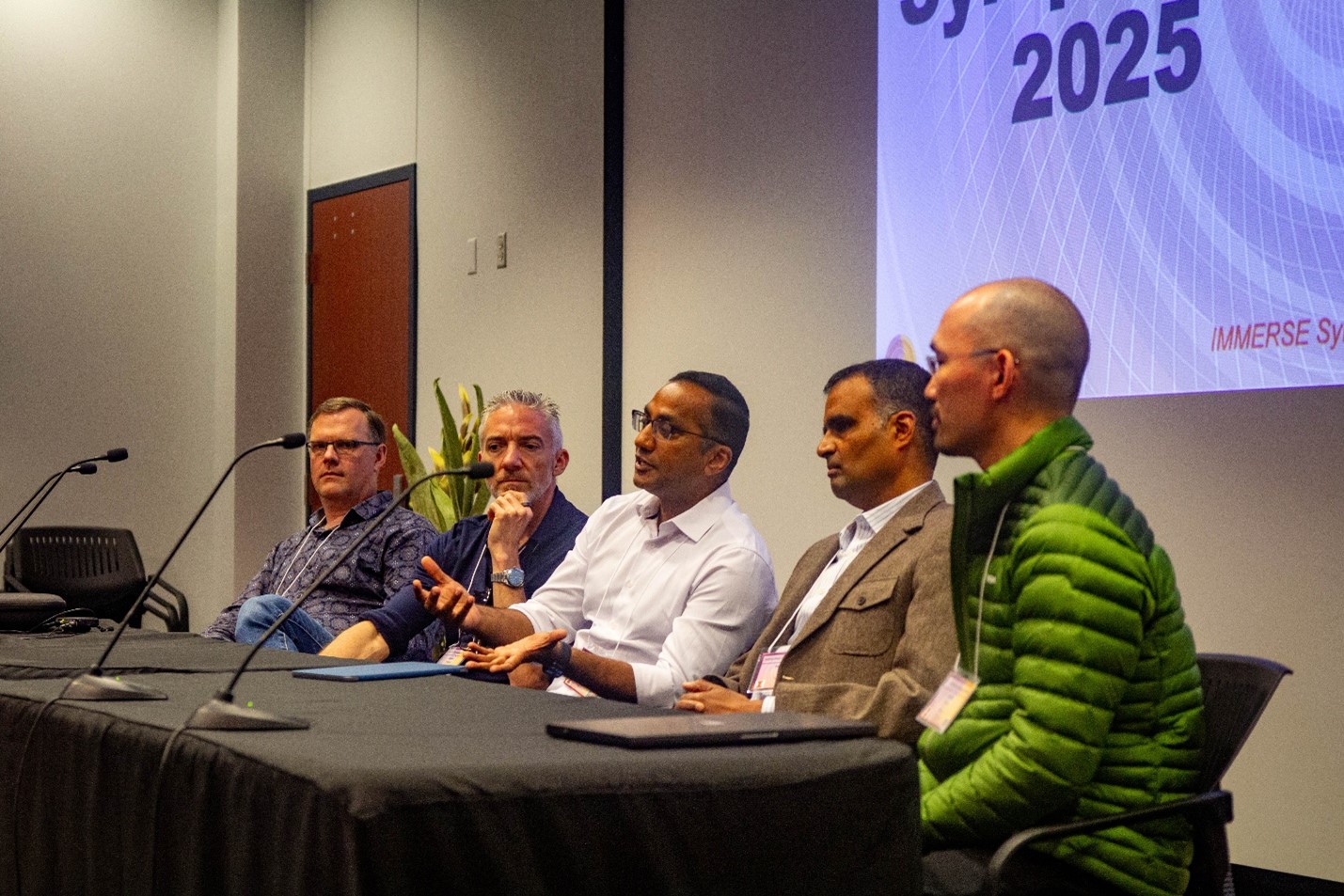 Industry leaders sharing their perspectives on the panel &amp;ldquo;Where are we today and what will it take?&amp;rdquo; L-R: Peter Capak (Meta Reality Labs), Robert Shearer (Meta), Chowdary Yanamadala (Arm), Prashanth Hande (Qualcomm), David Chu (NVIDIA).