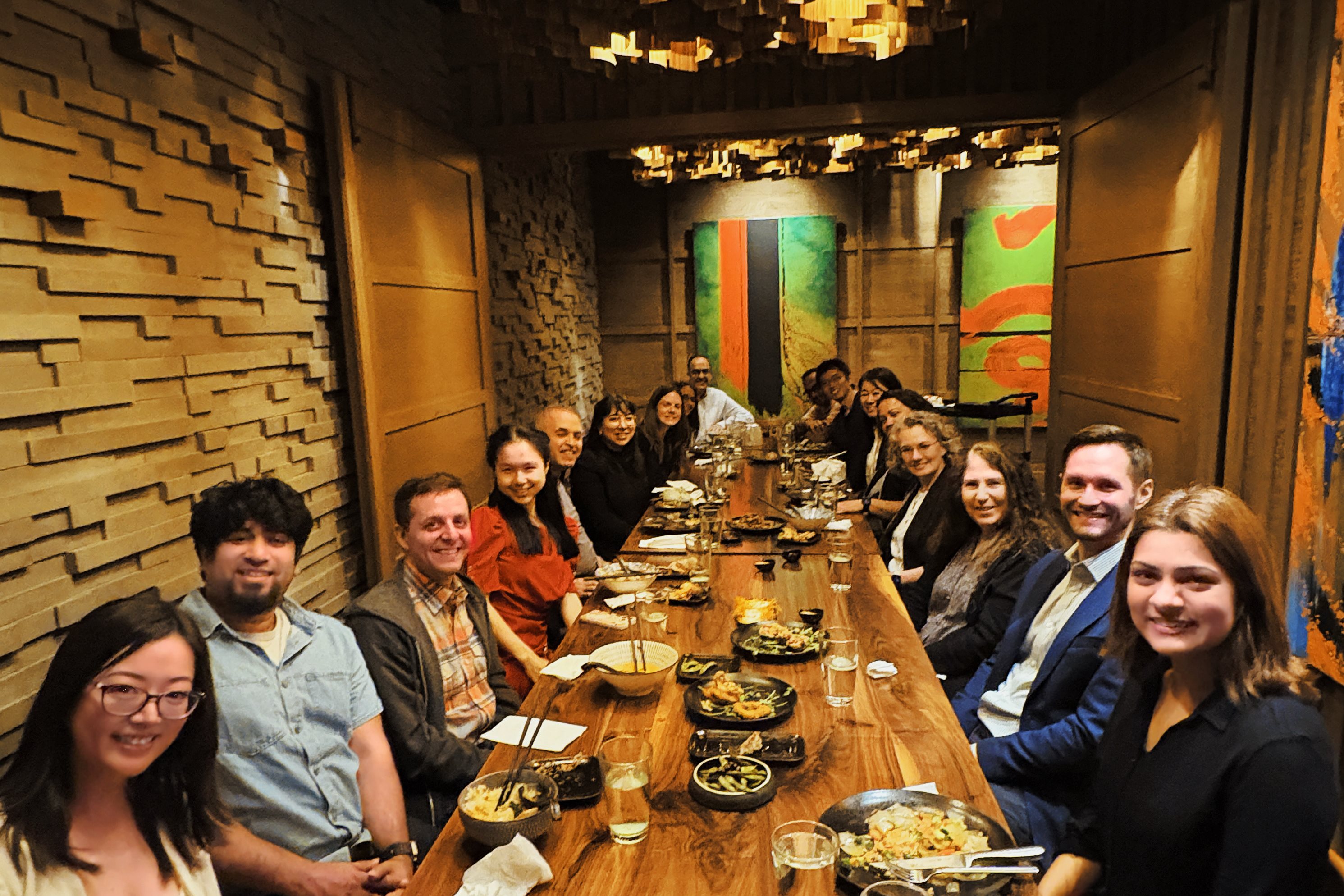 Illinois and Amazon speakers and guests celebrate the close of the AICE 2025 fall symposium.