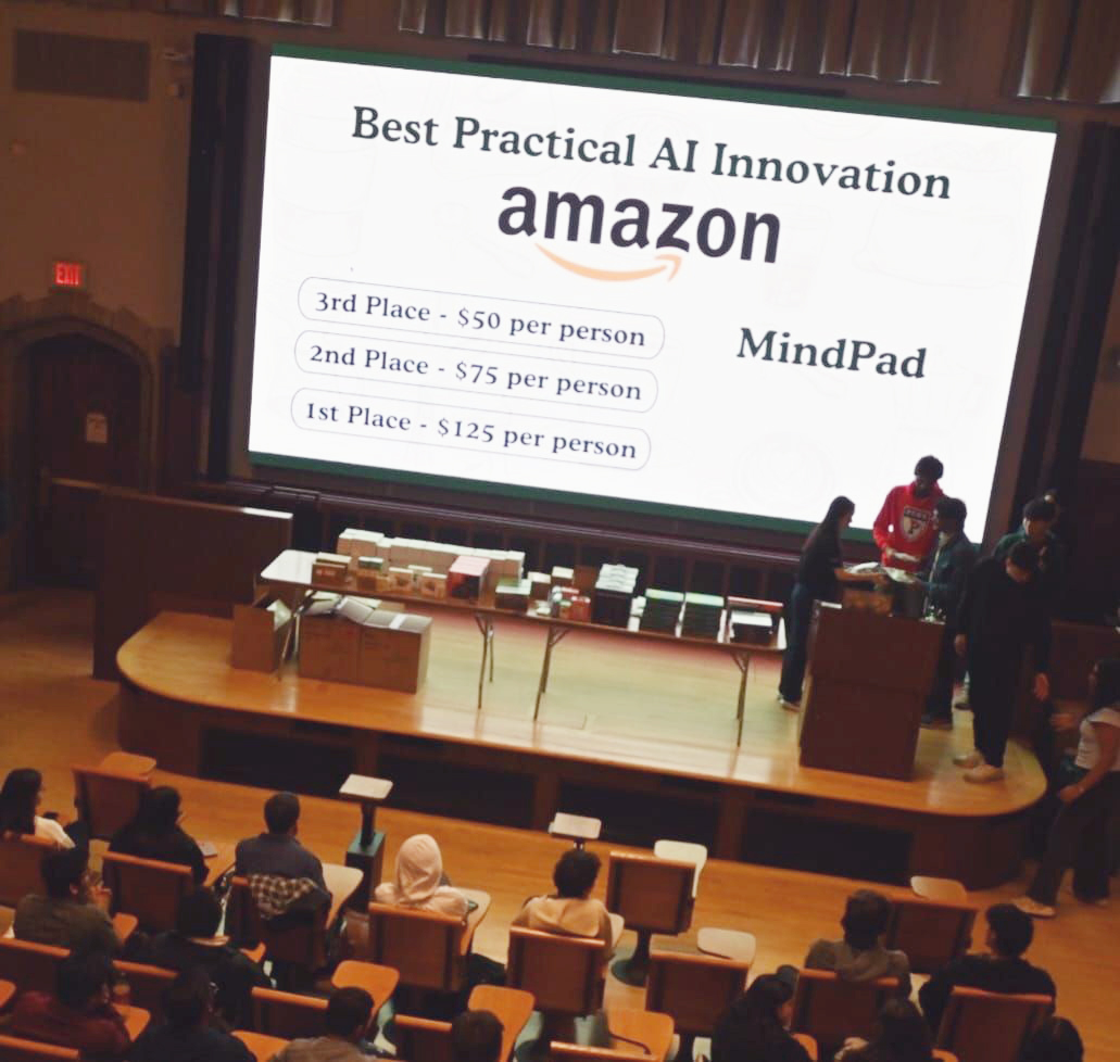 A slide is projected onto a classroom screen.