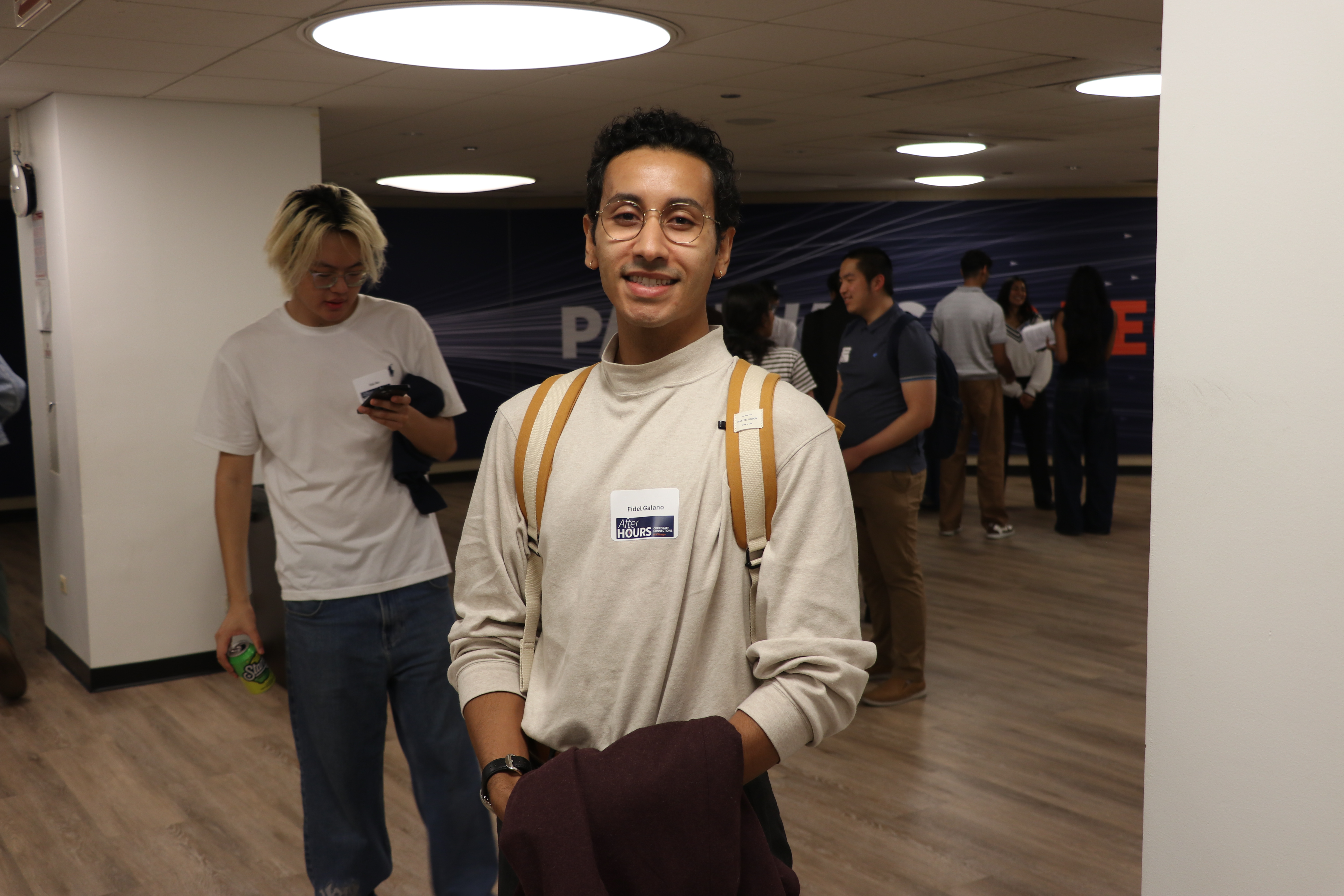 Fidel Galano smiles and poses for the camera at the MCS Chicago After Hours event