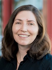 Headshot of Illinois CS professor Katie Cunningham, pictured in an outdoor setting.