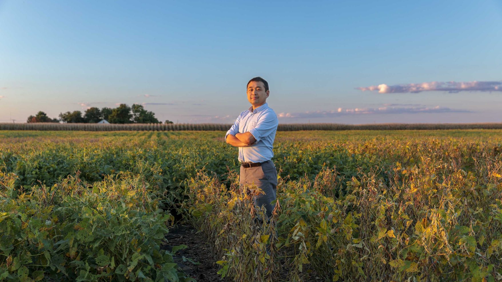 Illinois CS affiliate faculty member Kaiyu Guan picture taken outside, in the Illinois countryside.