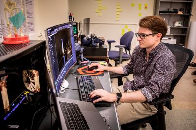 &acirc;&euro;&oelig;You can&acirc;&euro;&trade;t just import lectures into VR and expect to have good results,&acirc;&euro;&Acirc;Â says project manager Cameron Merrill. &acirc;&euro;&oelig;We&acirc;&euro;&trade;re trying to build an immersive educational experience.&acirc;&euro;&Acirc;Â  Photo by Fred Zwicky