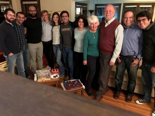 Roy Campbell and his wife, Ann (to his right), with members of his Systems Research Group in 2016. 