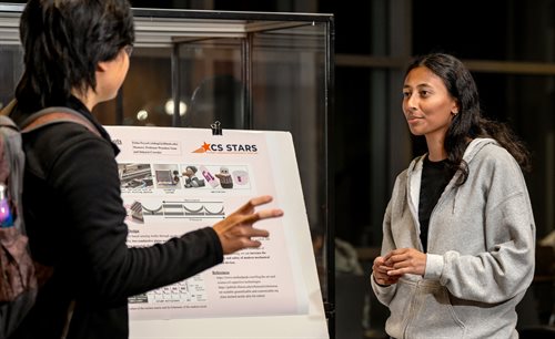 Eisha Peyyeti at the 2024 Trick or Research poster session.