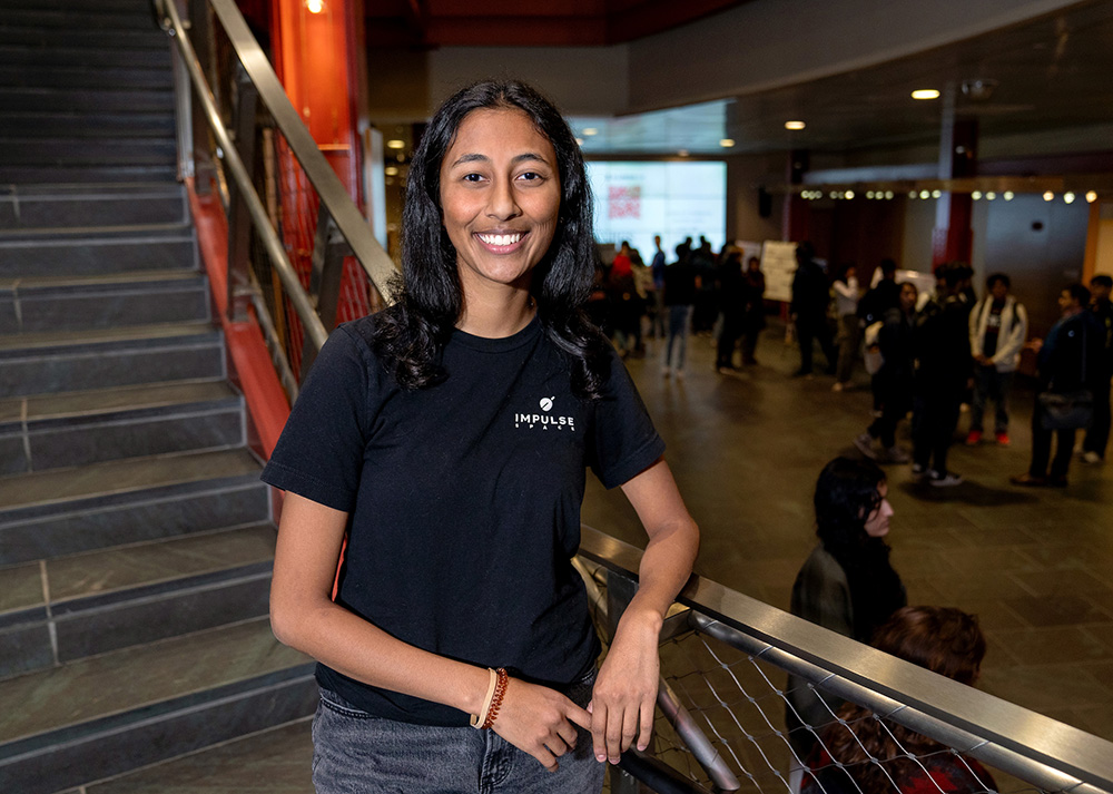 Eisha Peyyeti photographed on the lobby staircase at the Siebel Center for Computing Science.