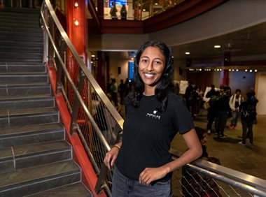 Eisha Peyyeti photographed on the lobby staircase at the Siebel Center for Computing Science.